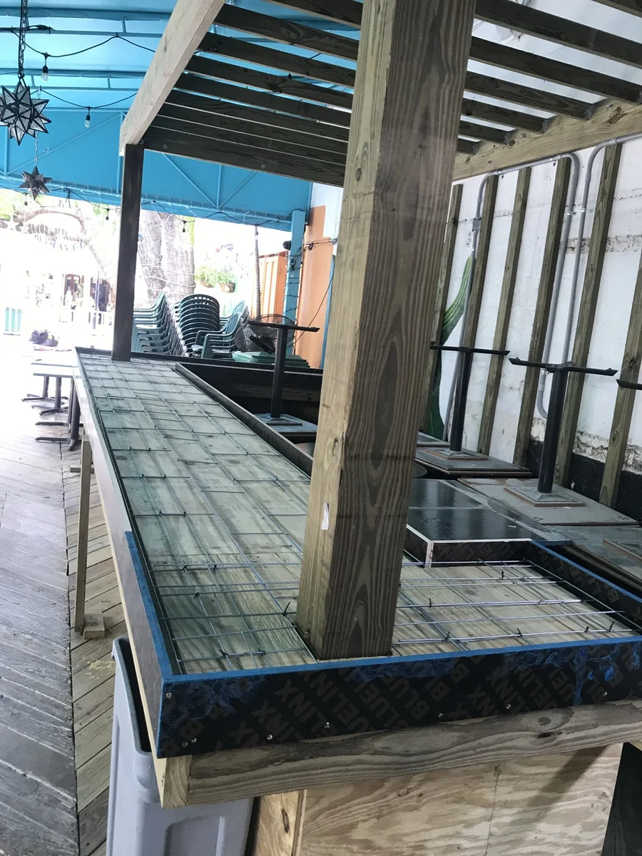 Formwork and steel reinforcement prepared for a custom bar countertop.