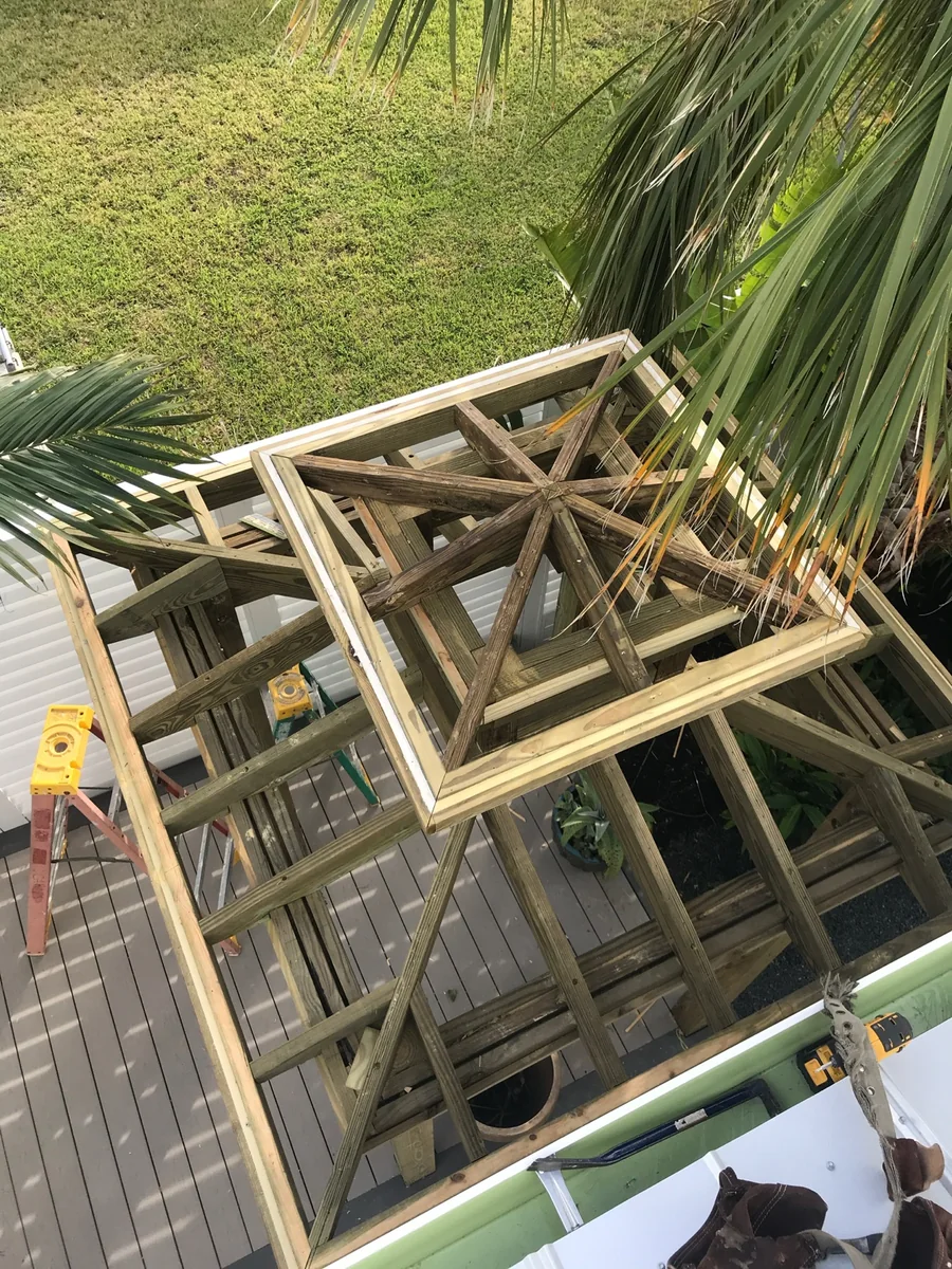 Timber pergola frame during outdoor construction.